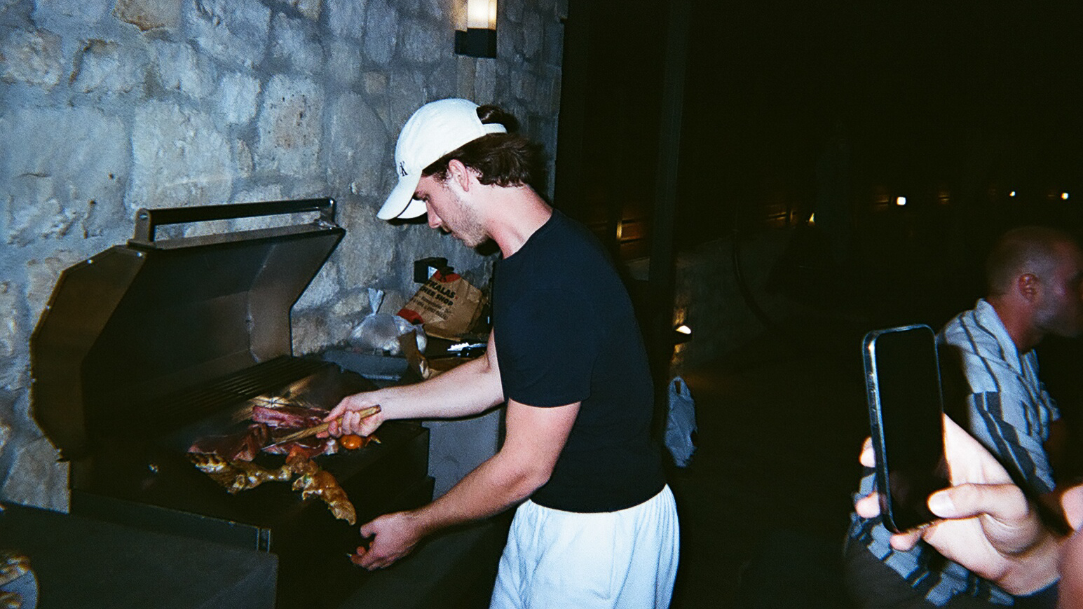 The team grilling together on a trip